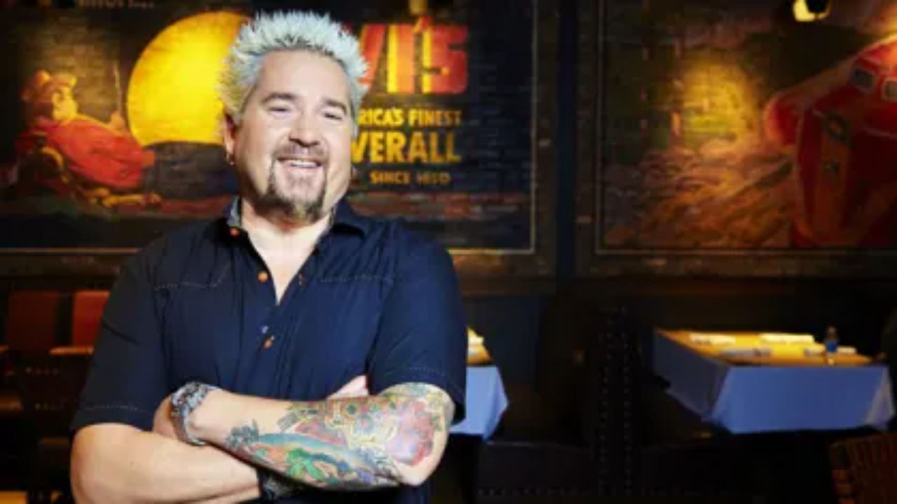 Guy Fieri works out with his personal trainer, Scott Butler. spritelybud.com